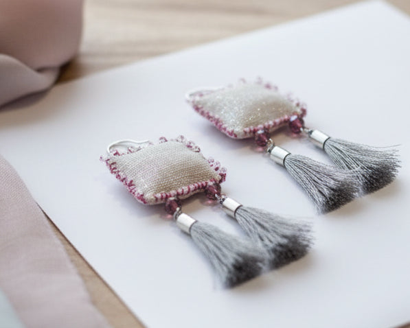 Handmade fabric and tassel earrings with pink beaded edges on white background, Asimico Jewellery